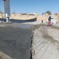 اجرای بتن محوطه با ماله پروانه‌ای