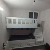 تخت دو طبقه ولی عملا سه تخته