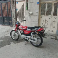سوزوکی ax100