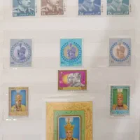 آلبوم تمبر نفیس شاهی و ست تمبر نقره گلدکوئست