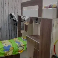 تخت دو طبقه همراه با کمد،میز تحریر،کتابخانه