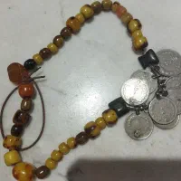 سکه و تسبیح قدیمی