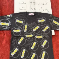 تعداد زیادی تیشرت شلوارک و لباس پسرانه