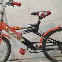 دوچرخه سایز ۲۰ نارنجی مشکی درحد نو تازه سرویس شده
