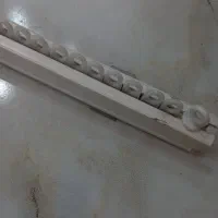 دو عدد چوب پرده  و یک عدد پشت پرده ۵متر
