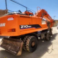 بیل مکانیکی لاستیکی دوسان 210