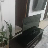 تلوزیون ال ای دی ۴۲ اینچ ال جی همراه میز تلوزیون