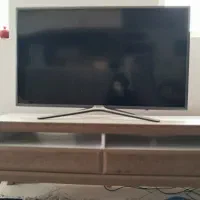 تلویزیون LED سامسونگ با میز(آسیب دیده)
