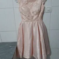 تعدادی مانتو و لباس مجلسی و کت مردانه