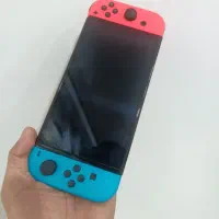 Nintendo switch oled 64GB همراه ۳ بازی