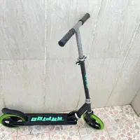 اسکوتر راپیدو و عروسک غول پیکر