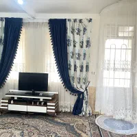 پرده و میزتلوزیون