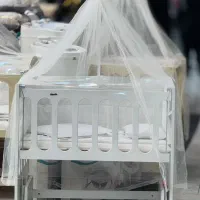 گهواره و کریر نوزاد چوبی