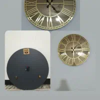 ساعت دیواری آینه ای طرح رومی طلایی
