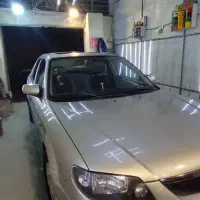 مزدا ۳۲۳ اتومات نقره ای