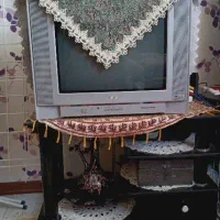 تلویزیون  و میز تلویزیون
