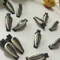 گیره مو‌طرح تخمه