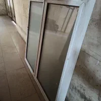 درب آهنی بالکن و پنجره آلومینیومی