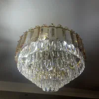 لوستر پذیرایی شامپاینی و سفید با ساعت دیواری ست