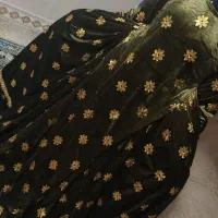 معاوضه با لباس محلی تیره