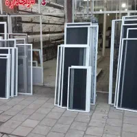 تولید درب وپنجره دوجداره توری کشویی شیشه بالکنی