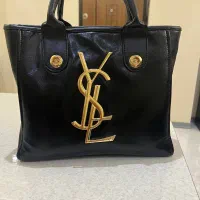 یک کیف ysl نو و مایکل کورس کارکرده
