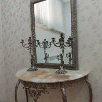 ایینه و شمعدان برنجی