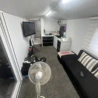 کانکس بازسازی شده با کابینت و کمد دیواری