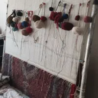 دستگاه  قالی به همراه فرش