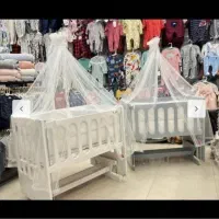 گهواره کنار مادر نوزاد