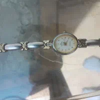 ساعت اورجینال رومانسون صفحه واجزا طلا واینک ریبن