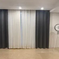 پرده و ساعت پایه دار