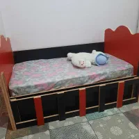 تخت و کمود کودک