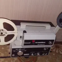 آپارات (پروژکتور) و پرده نمایش فیلم قدیمی