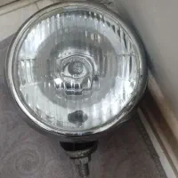 نور افکن پرنور و یک جفت آیینه استیل