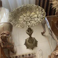 میوه خوری کنار سالنی تمام برنز