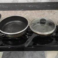 چهار عدد قابلمه و ماهیتابه (۷ پارچه)
