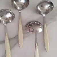 ملاقه استیل دسته طرح چرم