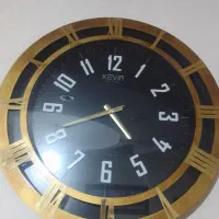 فروش۲عددساعت دیواری قیمت بزرگ قهوه ای۴تومن