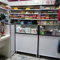 قفسه های فروشگاهی همراه با پایه و لچکی