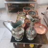تعداد 9عدد ظروف مسی نو 15ملیون تومن فروشی