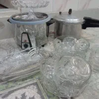 تعدادی ظرف پذیرایی دیس انگشتی کاسه زودپزپلوپز