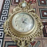 ساعت دیواری طرح طلایی