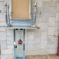 آیینه و شمعدان و کنسول