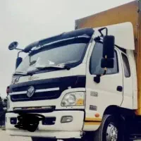 کارگر  حمل اثاث منزل همراه با ماشین
