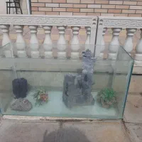 آکواریوم با همه وسایلش وپمپ آب همگی سالم وتمیز