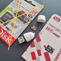 دو عدد کارت حافظه sandisk و رم ریدر