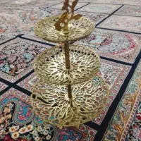 شیرینی خوری وساعت سینی
