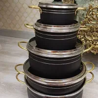 ۴عدد قابلمه بزرگ و یک عددتابه دسته طلایی