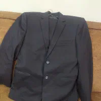 کت و شلوار و لباس مجلسی